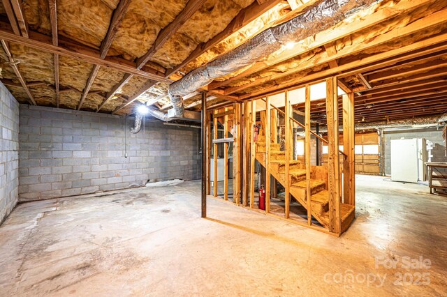 3781 Dover St, Claremont, NC 28610 - unfinished basement with freestanding refrigerator