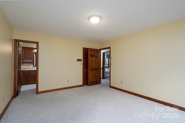 614 Azalea Ln, China Grove, NC 28023 - unfurnished bedroom with light carpet and connected bathroom