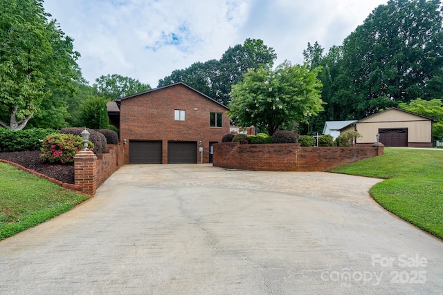 614 Azalea Ln, China Grove, NC 28023 - view of home's exterior with brick siding, driveway, an attached garage, and a lawn