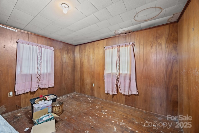 10 Manus Chapel Rd, Mill Spring, NC 28756 - unfurnished bedroom featuring wooden walls and wood-type flooring