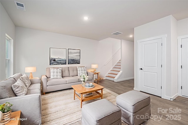 1951 32nd St NE Unit 1, Hickory, NC 28601 - living area with wood finished floors, stairs, and recessed lighting