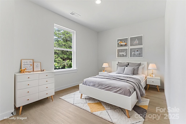 1951 32nd St NE Unit 1, Hickory, NC 28601 - bedroom featuring light wood-type flooring and recessed lighting
