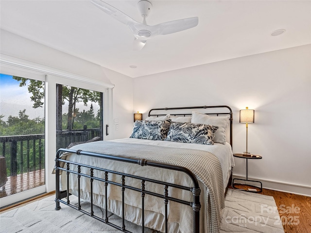 80 Raven Rock Vis, Lake Toxaway, NC 28747 - bedroom featuring access to exterior, wood finished floors, and a ceiling fan