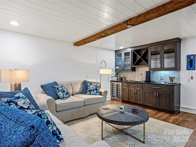 80 Raven Rock Vis, Lake Toxaway, NC 28747 - living area featuring wet bar, beamed ceiling, wood finished floors, wine cooler, and recessed lighting