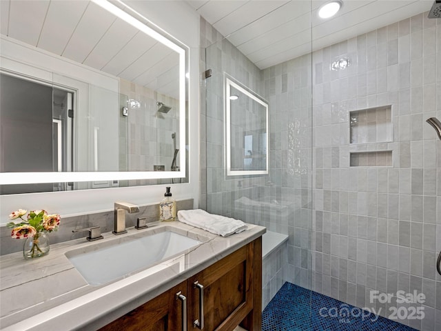80 Raven Rock Vis, Lake Toxaway, NC 28747 - bathroom featuring walk in shower, vanity, tile walls, recessed lighting, and tile patterned floors
