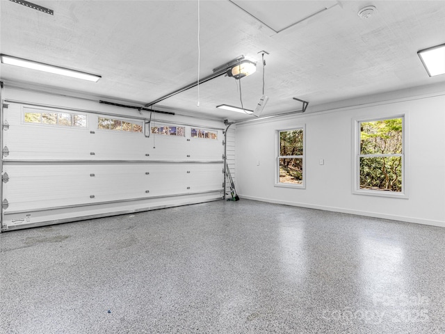 80 Raven Rock Vis, Lake Toxaway, NC 28747 - garage featuring a garage door opener and baseboards