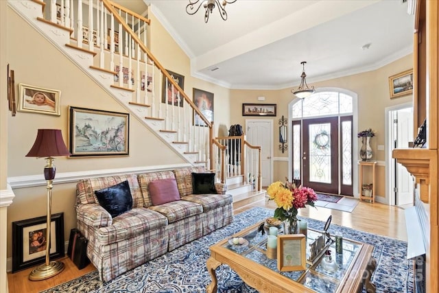 1511 Elkhart Cir, Gastonia, NC 28054 - living area featuring stairs, wood finished floors, and crown molding