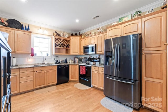 1511 Elkhart Cir, Gastonia, NC 28054 - kitchen featuring light brown cabinets, black appliances, light stone counters, light wood finished floors, and crown molding
