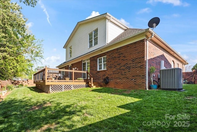 1511 Elkhart Cir, Gastonia, NC 28054 - rear view of property featuring brick siding, a lawn, and a deck