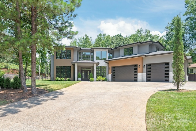 8403 Sarsfield Ct, Waxhaw, NC 28173 - contemporary home featuring driveway, french doors, stucco siding, and an attached garage