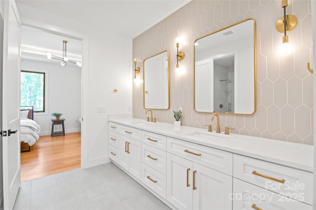 8403 Sarsfield Ct, Waxhaw, NC 28173 - full bath with double vanity, ensuite bathroom, and tile patterned floors