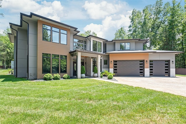 8403 Sarsfield Ct, Waxhaw, NC 28173 - contemporary home featuring concrete driveway and an attached garage