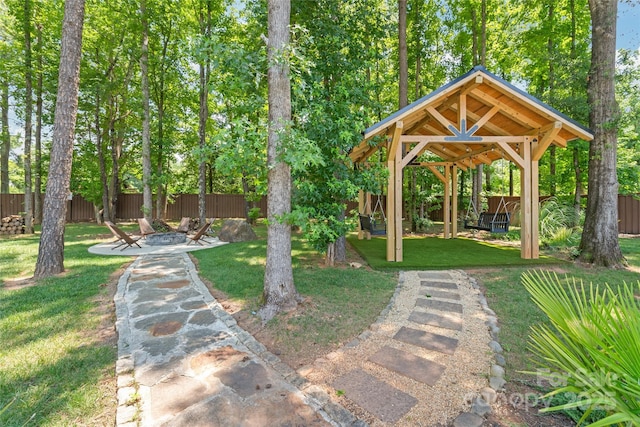 8403 Sarsfield Ct, Waxhaw, NC 28173 - fenced backyard with a gazebo and a fire pit