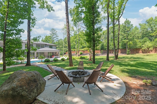 8403 Sarsfield Ct, Waxhaw, NC 28173 - view of patio with a fire pit