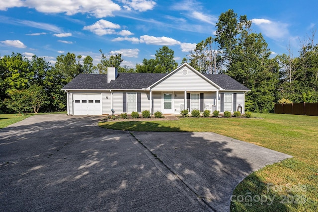 1012 Thorncrest Dr, Fletcher, NC 28732 - ranch-style home featuring driveway, an attached garage, and a chimney