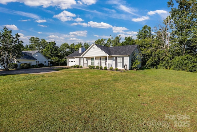 1012 Thorncrest Dr, Fletcher, NC 28732 - view of front of property with driveway, a garage, a front yard, and a chimney