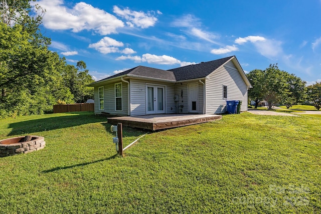 1012 Thorncrest Dr, Fletcher, NC 28732 - rear view of house with an outdoor fire pit, french doors, a wooden deck, and roof with shingles