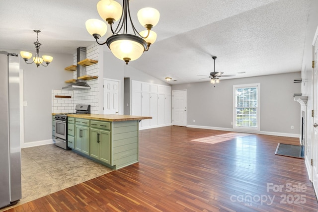 1012 Thorncrest Dr, Fletcher, NC 28732 - kitchen with green cabinetry, stainless steel appliances, butcher block countertops, a chandelier, and wood finished floors