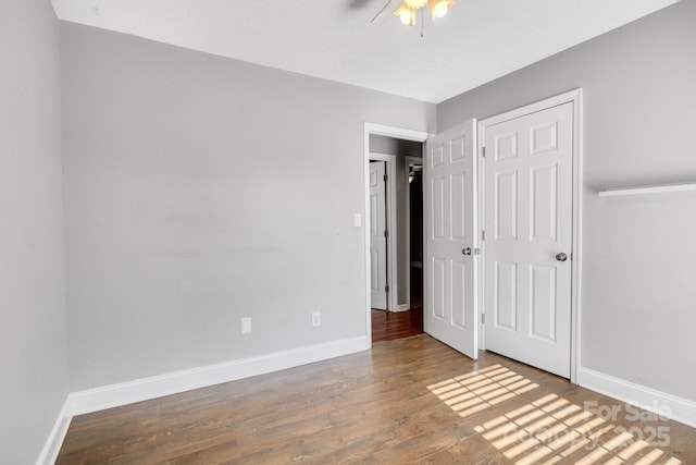1012 Thorncrest Dr, Fletcher, NC 28732 - unfurnished bedroom featuring wood finished floors and a ceiling fan