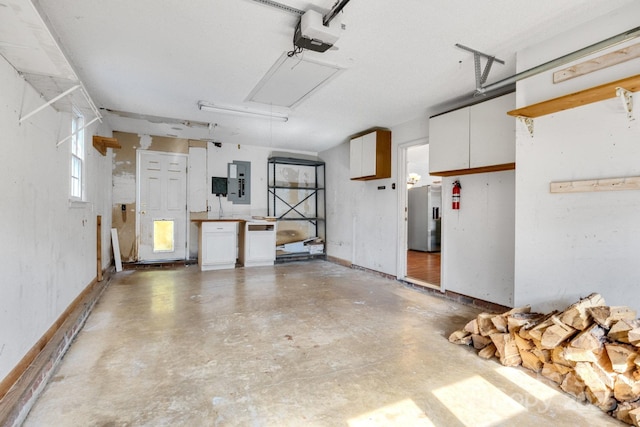 1012 Thorncrest Dr, Fletcher, NC 28732 - garage with a garage door opener and electric panel