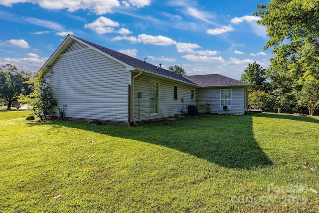1012 Thorncrest Dr, Fletcher, NC 28732 - view of property exterior with a yard and a central AC unit