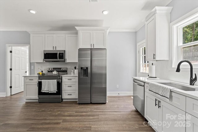 100 Boyette Dr Unit A, Albemarle, NC 28001 - kitchen featuring stainless steel appliances, light countertops, white cabinets, recessed lighting, and ornamental molding
