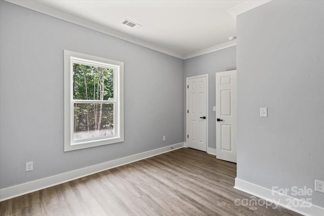 100 Boyette Dr Unit A, Albemarle, NC 28001 - unfurnished room with wood finished floors and crown molding