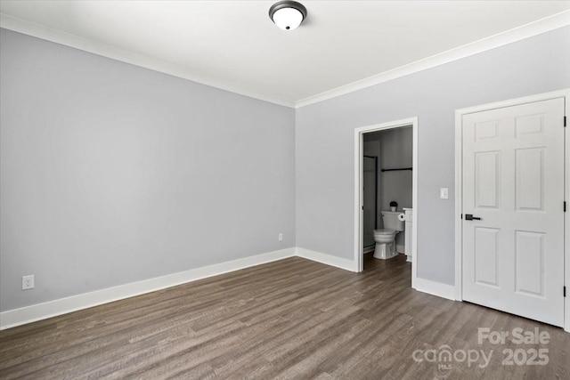 100 Boyette Dr Unit A, Albemarle, NC 28001 - unfurnished bedroom featuring ornamental molding, wood finished floors, and connected bathroom