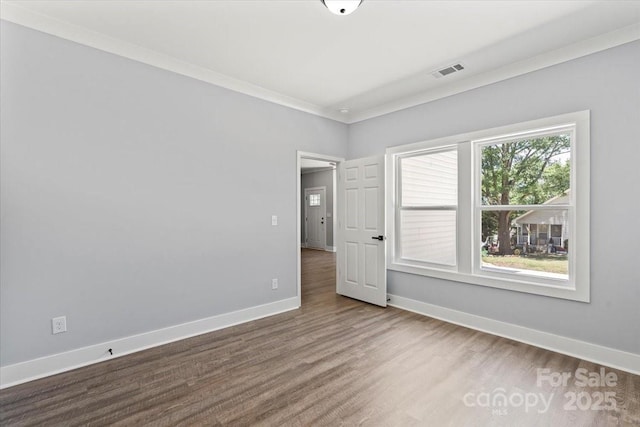 100 Boyette Dr Unit A, Albemarle, NC 28001 - unfurnished room with wood finished floors and ornamental molding