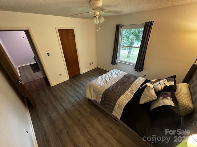 313 Willow St, Stanley, NC 28164 - bedroom featuring wood finished floors, a textured ceiling, and ceiling fan