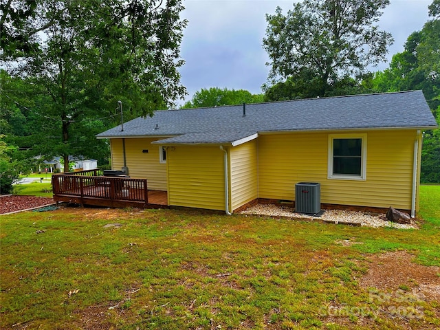 313 Willow St, Stanley, NC 28164 - rear view of property featuring a deck, a yard, and roof with shingles