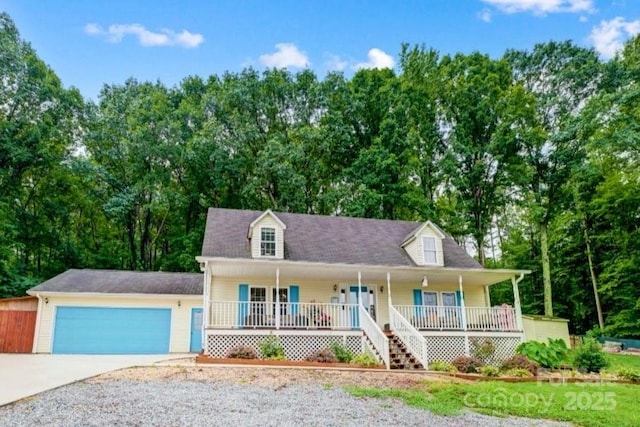 805 Edgewater Dr, Belmont, NC 28012 - cape cod-style house featuring a porch, driveway, a garage, and view of wooded area
