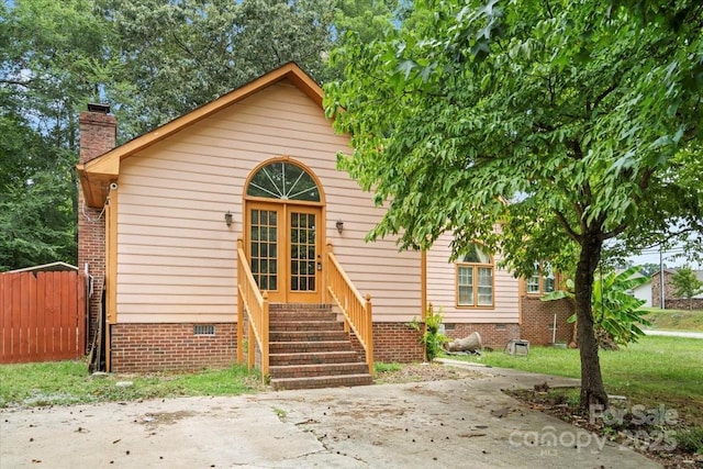 6500 Peacehaven Dr, Charlotte, NC 28214 - view of front facade with crawl space and a chimney