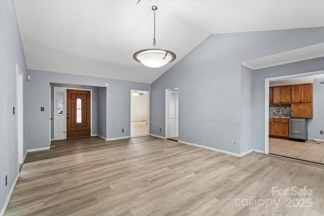 6500 Peacehaven Dr, Charlotte, NC 28214 - foyer entrance with vaulted ceiling and light wood-style flooring