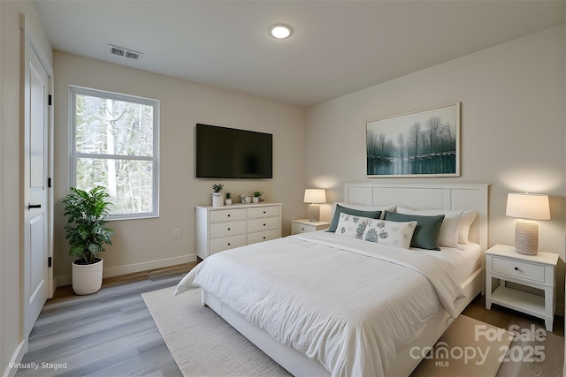 815 32nd St NE Unit 3, Conover, NC 28613 - bedroom with light wood finished floors and recessed lighting