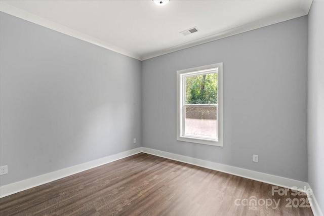 100 Boyette Dr Unit B, Albemarle, NC 28001 - unfurnished room with dark wood finished floors and ornamental molding