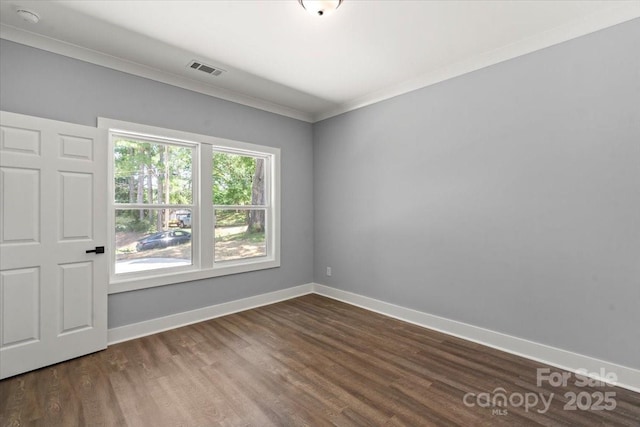 100 Boyette Dr Unit B, Albemarle, NC 28001 - unfurnished room with crown molding, dark wood-style floors, and a smoke detector