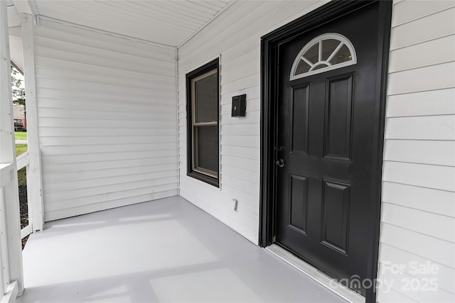 501 N Apple St Unit 103, Gastonia, NC 28054 - view of exterior entry featuring covered porch