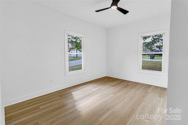 501 N Apple St Unit 103, Gastonia, NC 28054 - empty room with light wood-style floors and ceiling fan