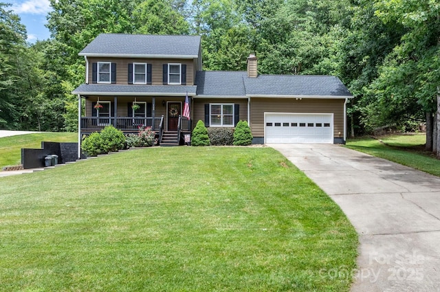 123 Clearwater Dr, Morganton, NC 28655 - colonial house featuring covered porch, driveway, a chimney, a garage, and a front yard