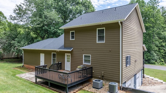 123 Clearwater Dr, Morganton, NC 28655 - rear view of house with roof with shingles, a lawn, a wooden deck, and an attached garage