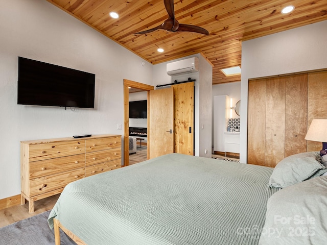 511 Emerald Mine Rd, Spruce Pine, NC 28777 - bedroom with wooden ceiling, a wall unit AC, recessed lighting, wood finished floors, and a barn door