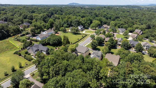 1902 4th Street Ct NW, Hickory, NC 28601 - aerial perspective of suburban area featuring a heavily wooded area