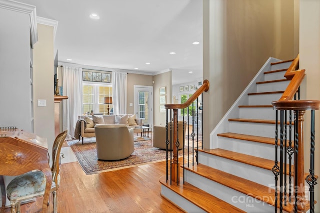 1902 4th Street Ct NW, Hickory, NC 28601 - stairs featuring wood finished floors, ornamental molding, and recessed lighting