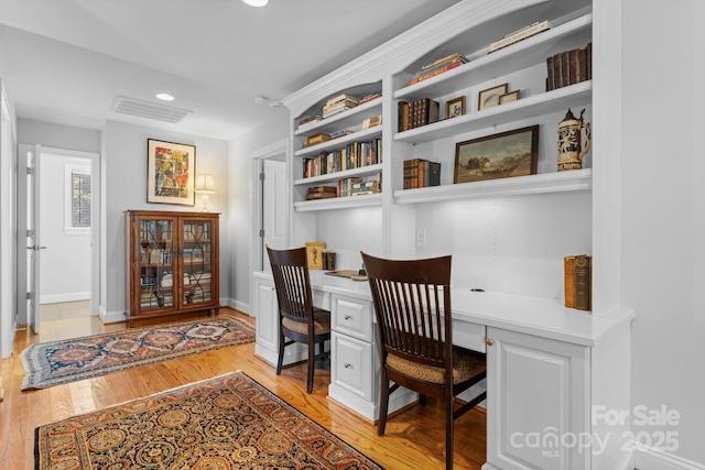 1902 4th Street Ct NW, Hickory, NC 28601 - office space with built in desk, light wood-type flooring, and recessed lighting