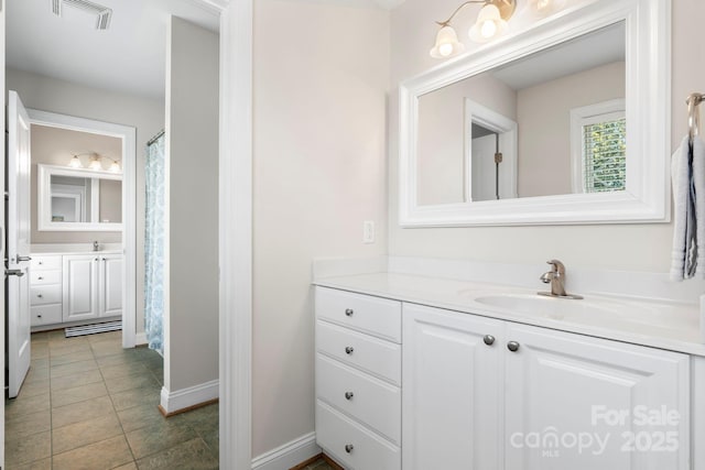 1902 4th Street Ct NW, Hickory, NC 28601 - bathroom with vanity, tile patterned floors, and a shower with shower curtain