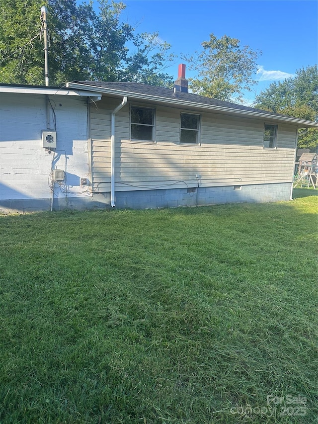 508 S Ave SW, Valdese, NC 28680 - view of side of property featuring a yard, a chimney, and crawl space