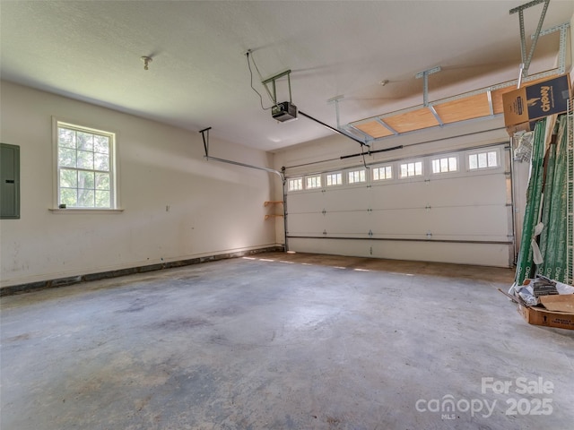 690 Mountain Rd, Hendersonville, NC 28791 - garage featuring a garage door opener and electric panel