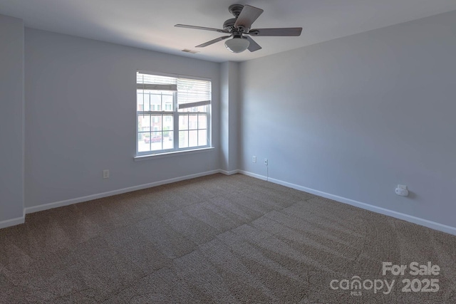 10011 Treeside Ln, Matthews, NC 28105 - carpeted spare room with baseboards and ceiling fan