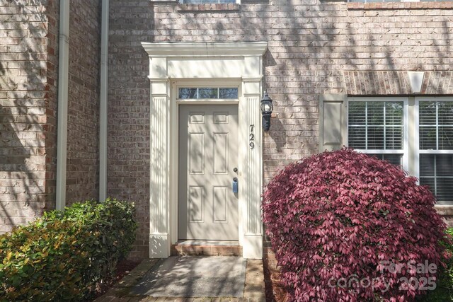 729 Naramore St, Davidson, NC 28036 - view of exterior entry with brick siding
